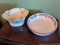 Two ceramic holiday dishes on table