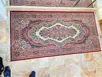 Full view of rectangular rug showing pattern and overall size