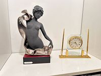 Overall view of figurine and clock together