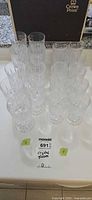 All seventeen crystal wine glasses grouped on table