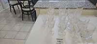 Group of crystal stemware and tumblers on counter