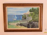 Full view of framed seascape painting
