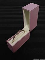 Bangle in open pink box