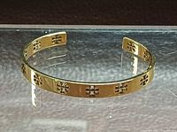Full view of bracelet upright showing exterior logos