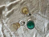 Top view of three colored liqueur glasses