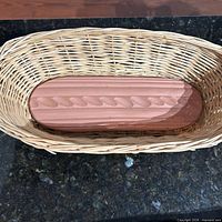 Wicker basket with terracotta stone inside