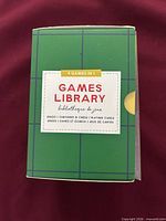 Front of sealed green Games Library box showing 4 games listed