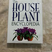 Front cover showing title and potted plant graphic