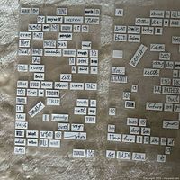 Both sheets showing numerous individual word stickers on backing