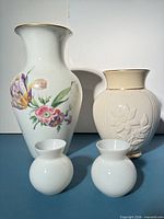Group shot of all four vases showing size and style differences