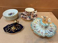 Group shot of all porcelain items in lot