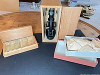 Overall view of microscope in wooden case with slide box and accessory box