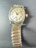 Full view of Waltham wristwatch showing dial and expansion bracelet