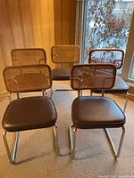 Front view of all five cantilever chairs