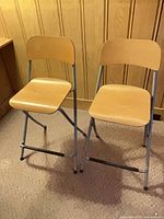 Pair of IKEA folding counter stools, full view