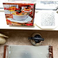 All three items: boxed microwavable hot plate, electric warming tray, kettle