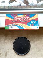 Front of Scrabble box showing branding and graphics