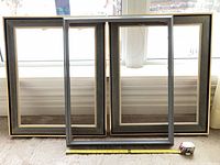 All three picture frames with measuring tape showing 24" width