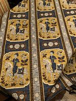 Overall view of patterned upholstery fabric laid out