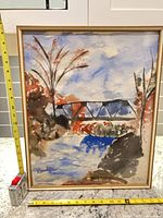Full framed painting with measuring tapes showing overall size