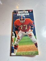 Front cover showing title and player #77