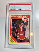 Front of PSA-encased card showing player image, grade label