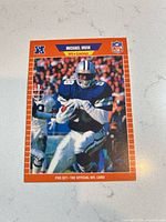 Front of Michael Irvin rookie card showing action photo and border
