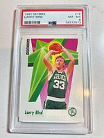 Front of PSA-slabbed Larry Bird SkyBox card showing grade label