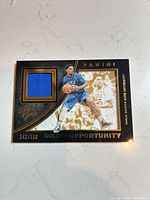 Front of Panini Black Gold Jahlil Okafor jersey card showing image, patch, and serial number