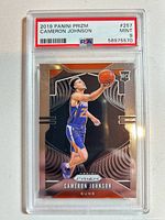 Front of PSA-slabbed Cameron Johnson rookie card showing grade and certification