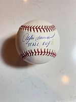 Autographed panel showing Andre Dawson signature and inscription