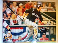 Full view of autographed 16x20 photo showing Brad Hawpe batting