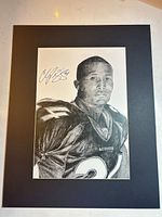 Full view of matted autographed lithograph