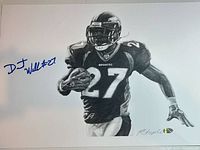 Autographed lithograph showing Darrent Williams in full uniform, blue signature visible