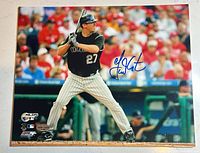 Full view of autographed 8x10 photo showing Garrett Atkins batting