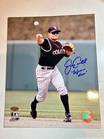 Full view of signed photo showing player image and holograms