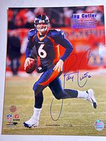 Full view of signed Jay Cutler limited edition photograph showing autograph, edition number and hologram