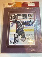 Front view of sealed Patrick Roy matted photo print in Timeless Sports packaging