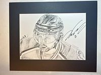 Full view of matted lithograph showing image and signature