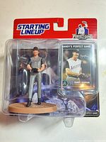 Front of sealed Starting Lineup package with figure and trading card visible