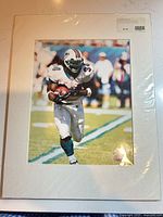 Matted photo print sealed in plastic wrap