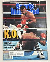 Front cover with Mike Tyson knockout image and shipping label