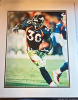 Full view of matted 16x20 signed Terrell Davis photograph