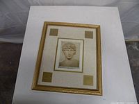 Front view showing artwork, mat, frame detail