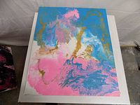 Blue, pink and gold fluid-pour painting on canvas