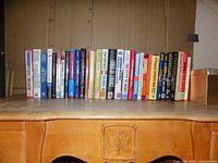 Front view of full row of finance books on a desk
