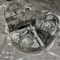 Four interlocking crystal candleholders assembled