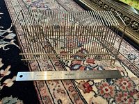 Record rack top view with 12-inch ruler for scale