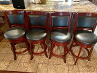 Front view of all four barstools aligned