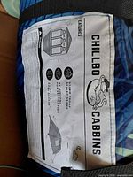 Carry bag showing Chillbo Cabbins label and feature list